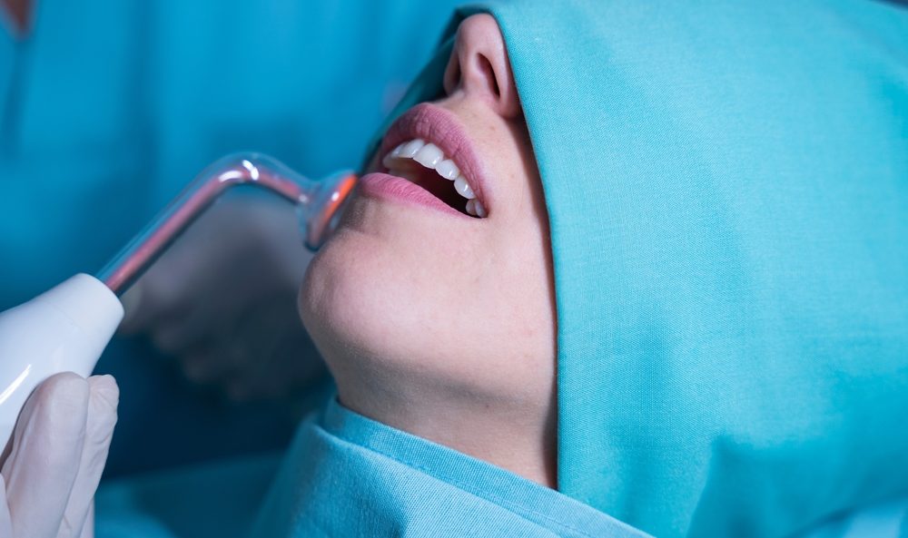 Patient Receiving Ozone Dental Treatment